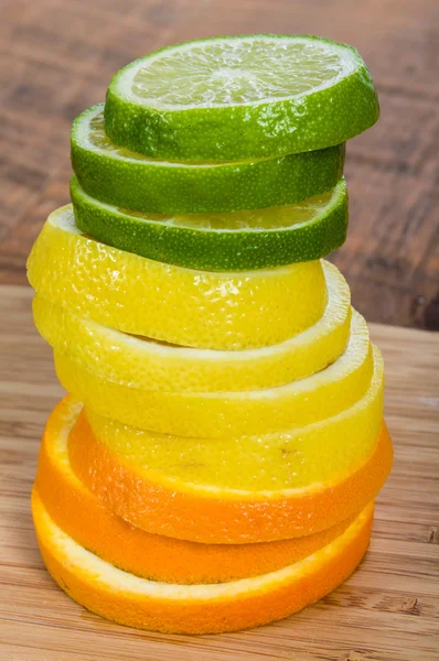 Stack of lemon, lime  orange — Stock Photo, Image