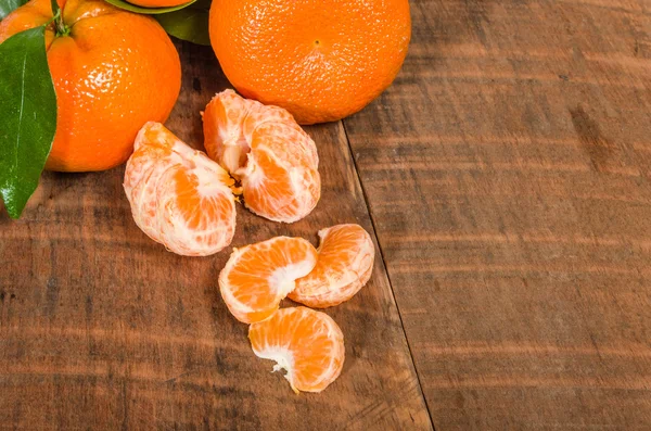 Tangelos e sezioni di frutta — Foto Stock
