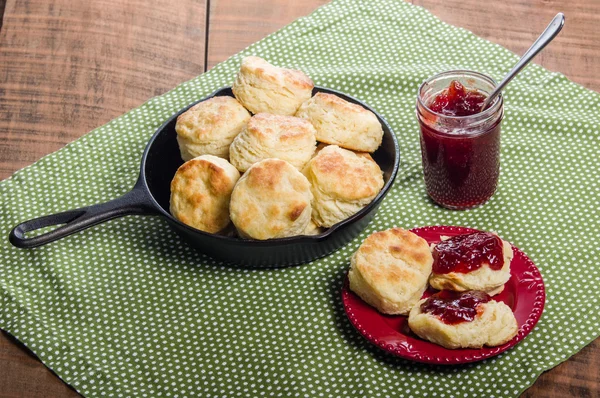 Fresh baked biscuits and jam or preserves — Stock Photo, Image