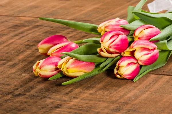 Bouquet of fresh pink and yellow tulips — Stock Photo, Image