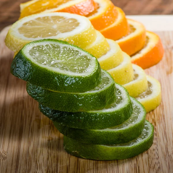 Lemon, lime and orange slices — Stock Photo, Image