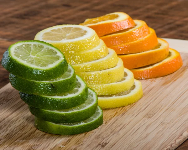 Lemon, lime and orange slices — Stock Photo, Image