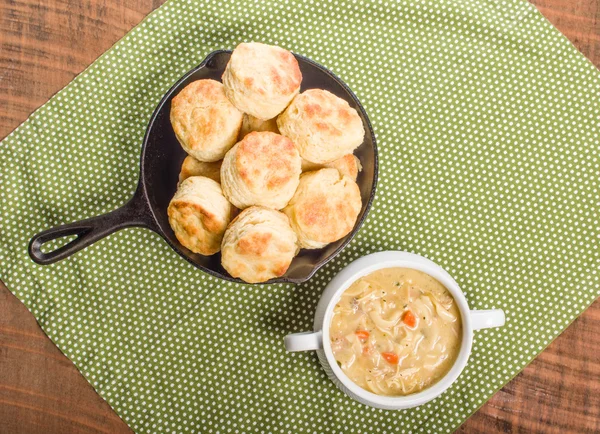 Chicken soup with baked biscuits — Stock Photo, Image