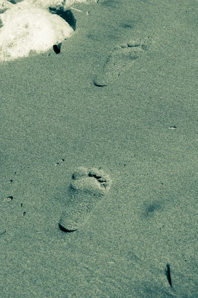 Fußstapfen am Strand Sand — Stockfoto