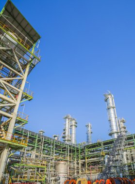 Refinery tower in sunny day