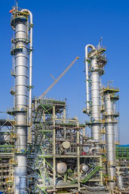 Refinery tower in sunny day