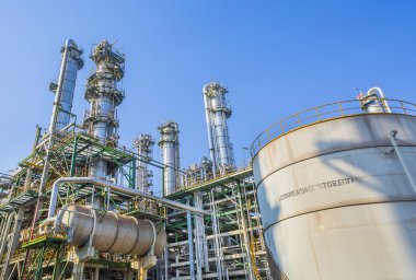 Refinery tower in sunny day