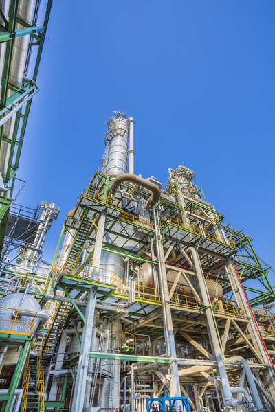 Refinery tower in sunny day