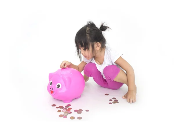 Aziatische kinderen met roze piggy bank — Stockfoto