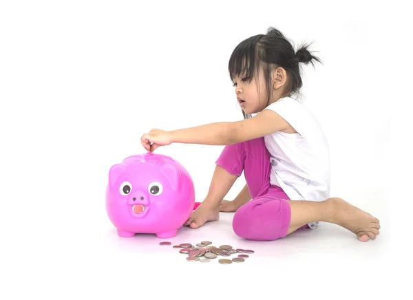 Aziatische kinderen met roze piggy bank — Stockfoto