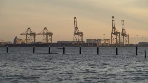 Fishing boat sail at sea. Background North Butterworth Container Terminal — Stock Video