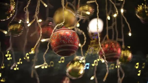 Selektiv Fokus Jul Boll Med Musik Ljus Bakgrund — Stockvideo