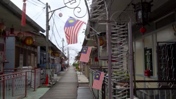 Malaysia flagga vinka utanför Lee Jetty klan — Stockvideo