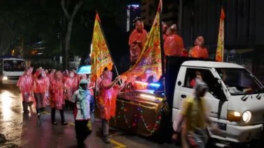 Butterworth, Penang, Malaysia - Dec 16 2018: Chingay procession during raining day at night.