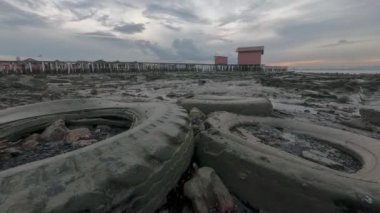 Timealpse crab move at rubbish tire near dirty coastal