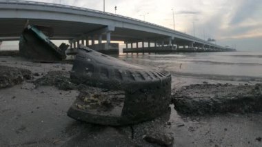 Timelapse morning of abandoned tire rubbish at sea coastal