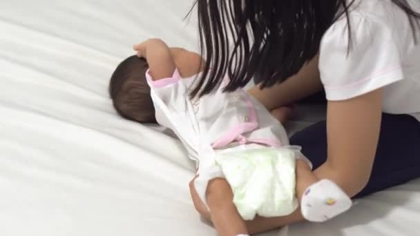 Sister Try Cuddle New Born Baby Sibling Love — Stock Video