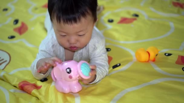 Little Baby Boy Play Pink Elephant Shower Bed — Stock Video