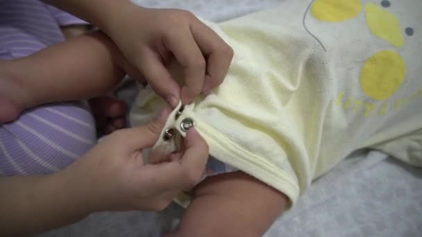 Sister Help Wear Romper Little Baby Boy — Stock Video