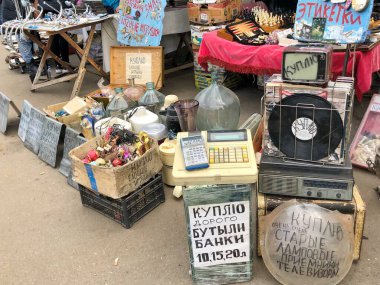March 27, 2021, Ukraine, Kharkov. Swap meet, sale of old things. open-air flea market. Old scammers, vinyl records. Many vintage rare Soviet things clipart