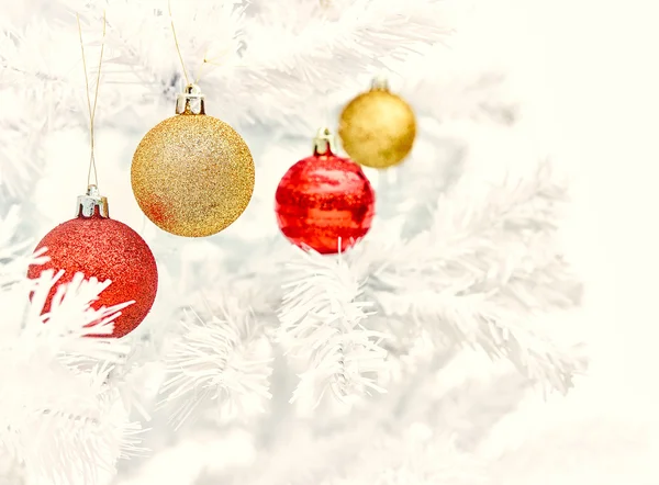 Christmas ornaments and tree — Stock Photo, Image