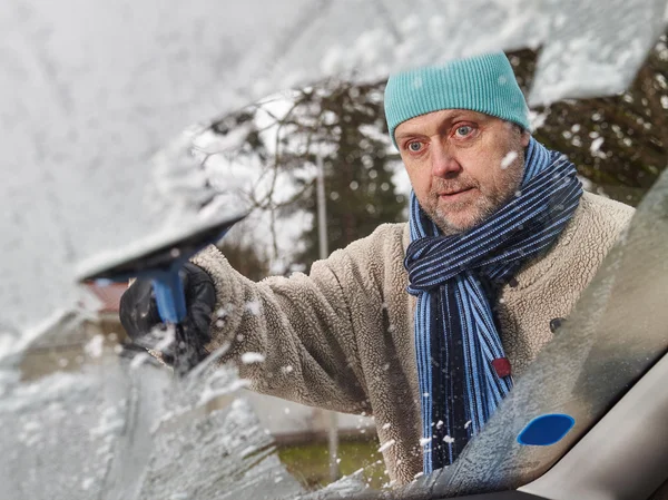 Male and ice scraper — Stock Photo, Image