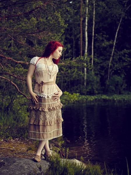 Attractive woman on the lake — Stock Photo, Image