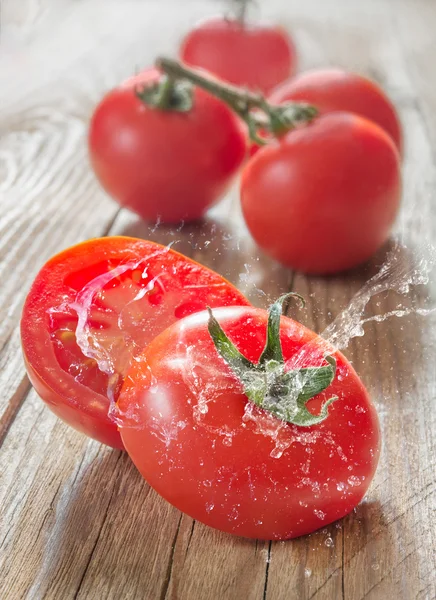 Tomatoes on wood — Stock Photo, Image