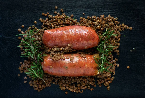 Tahta taşlı mercimekli domuz kotekino. Tipik Noel yemeği.