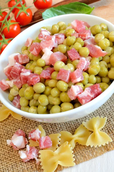 Peas and bacon — Stock Photo, Image