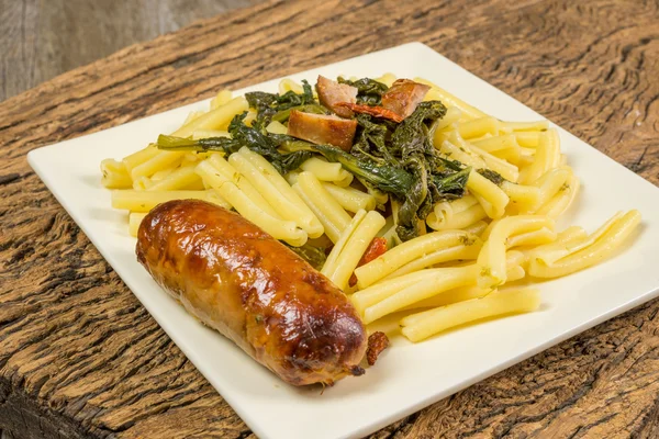 Pasta broccoli and sausages — Stock Photo, Image