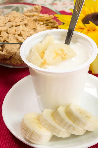 Yogurt with banana — Stock Photo, Image