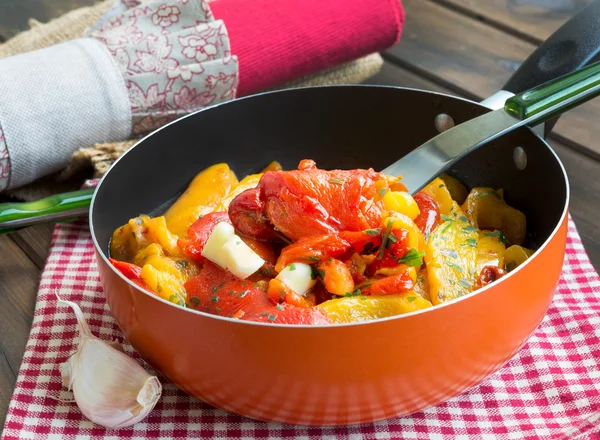 Peppers fried in a pan — Stock Photo, Image