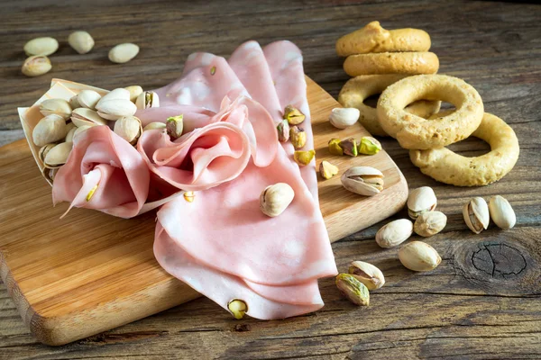 Mortadella and pistachios — Stock Photo, Image