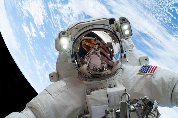 Astronaut in Space; Elements of this image furnished by NASA