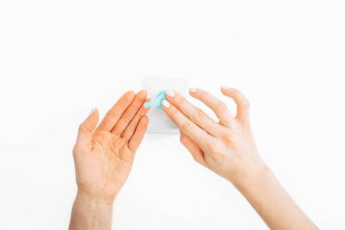 Hands applying hand sanitizer against coronavirus, on white background