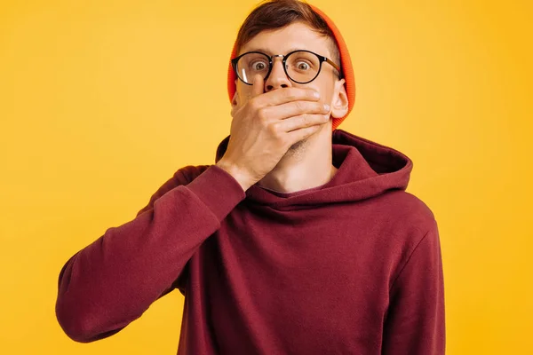 Man Covered His Mouth His Hand Frightened Man Orange Hat Stock Image