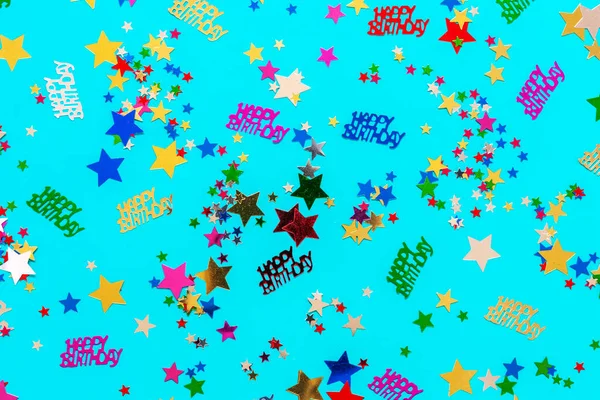 Conceito Feliz Aniversário Com Glitter Confetti Multicolorido Fundo Azul — Fotografia de Stock