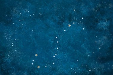 Astronomik Göksel Şablon Takımyıldızı Yıldız Şeklinden Akrep Mavi arka planda gümüş konfeti