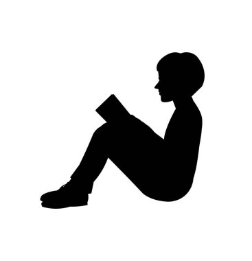Isolated silhouette of a reading schoolboy with a book in his hands