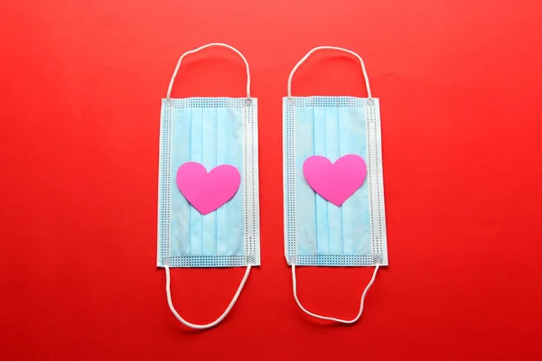 Tri-layer protection mask for clinical use and hearts.Valentine\'s Day in a pandemic due to covid-19,