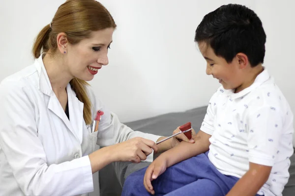 Female Professional Pediatrician Doctor Working Checking Happy Latin Child — Stock Photo, Image