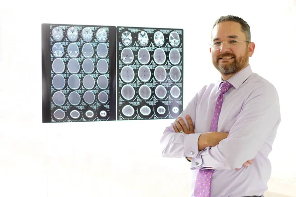 Doctor Medical Specialist in Professional Neurology of his work reviews x-rays of the brain or CT scans of his patient