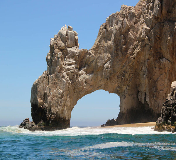 The Arch of Cabo San Lucas also called the end of the earth in the Sea of Cortes of the Baja California Peninsula Mexico