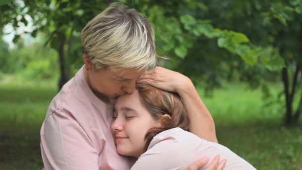 Mother Calms Her Crying Daughter Sitting Blanket Park Transitional Age — Video