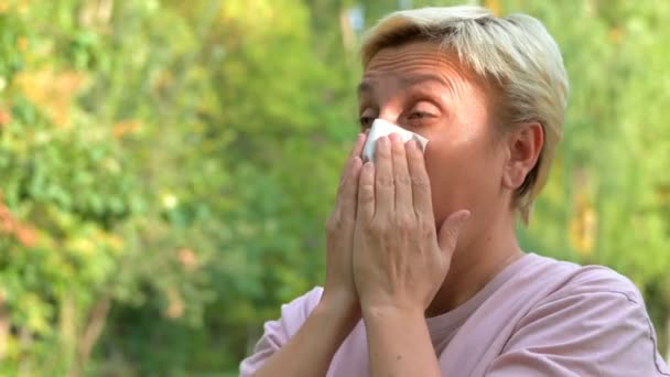 Blonde Girl Short Haircut Close Sneezes Blows Her Nose Paper — Stock Video
