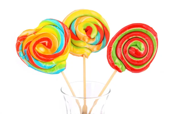 Drie kleurrijke snoepjes geïsoleerd op witte achtergrond — Stockfoto