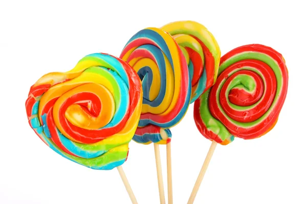 Négy színes cukorkák elszigetelt fehér background — Stock Fotó