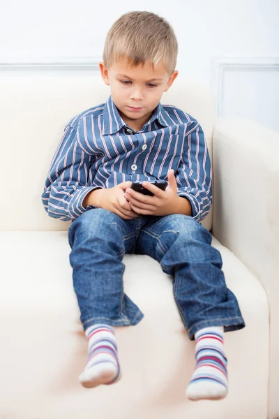 Boy and mobile phone — Stock Photo, Image