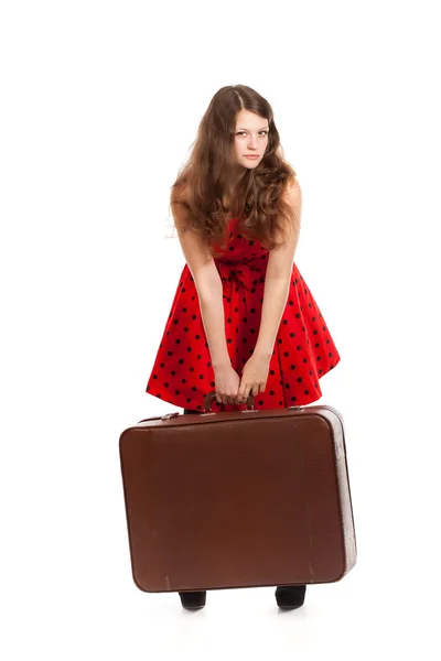 笑顔の女性はスーツケースを保持します。 — ストック写真